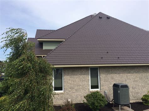 tudor brown metal roof